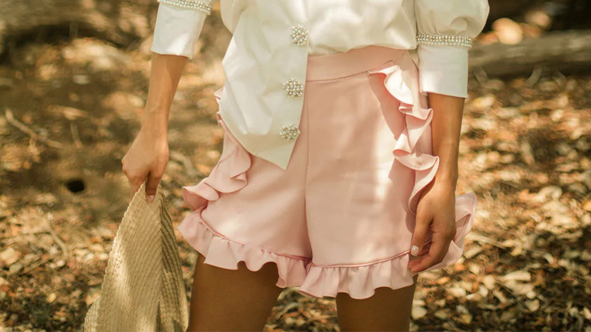 a model using a spring outfit showing what to wear with pink short in OnPost