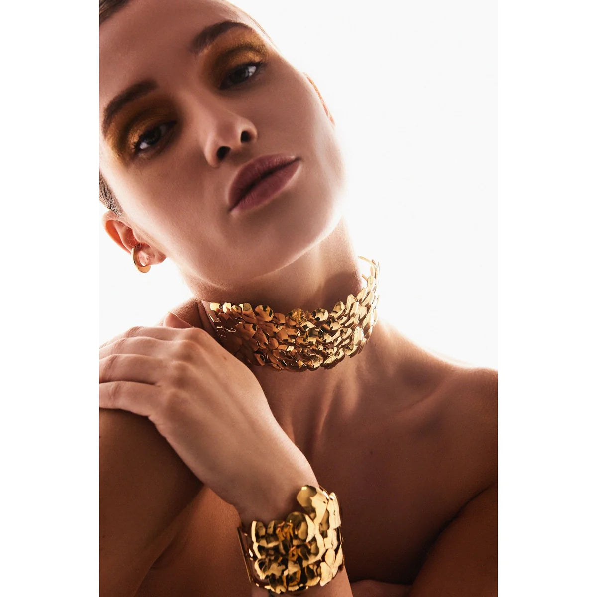 an OnPost model showing how to style bracelets with brilliance on detail