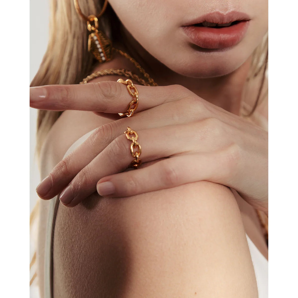 A model showing what to wear with golden rings in a chic OnPost way