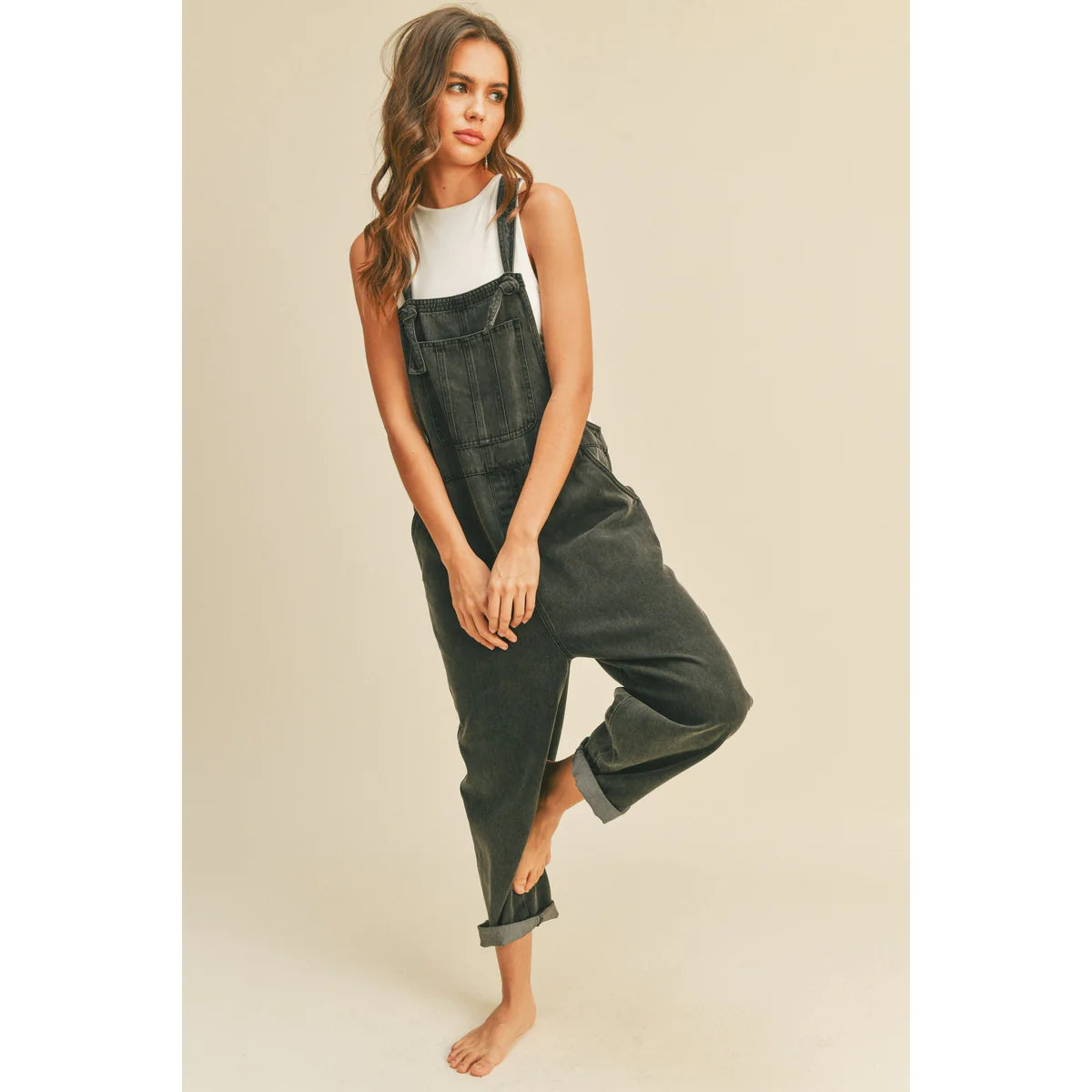 an OnPost model showing how to style overalls with beauty and comfort