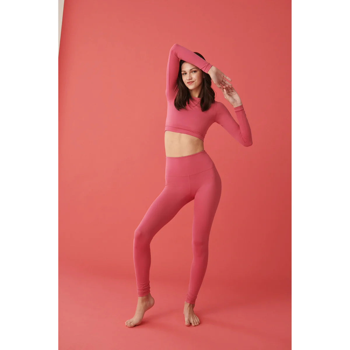 a OnPost model showing what to wear to the gym in a pink outfit with fashion for fitness