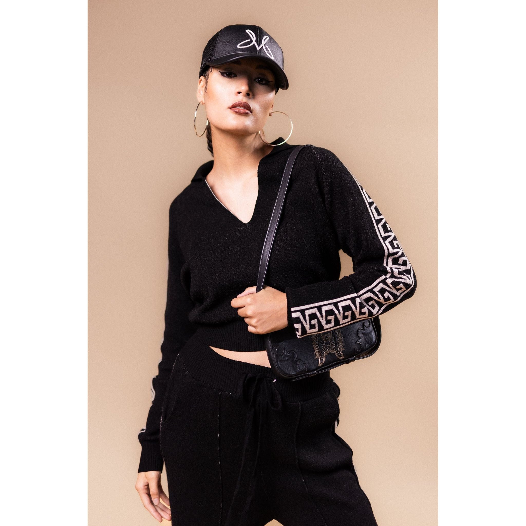 Charro tracksuit negro y hueso