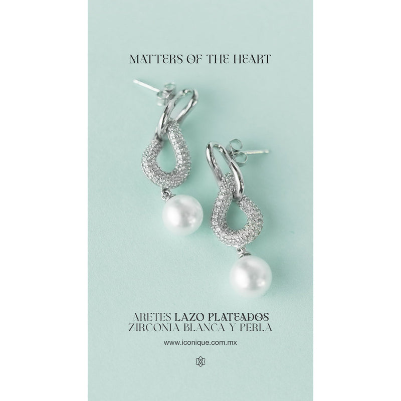 Silver earrings featuring white zirconia and a pearl