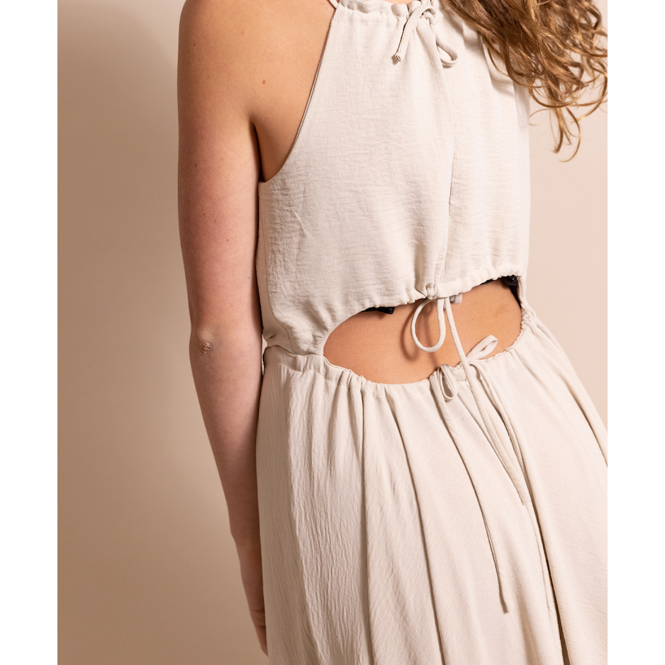 An Elegant Statement: What to Wear with a Halter Neck Dress Onpost An Elegant Statement: What to Wear with a Halter Neck Dress Onpost