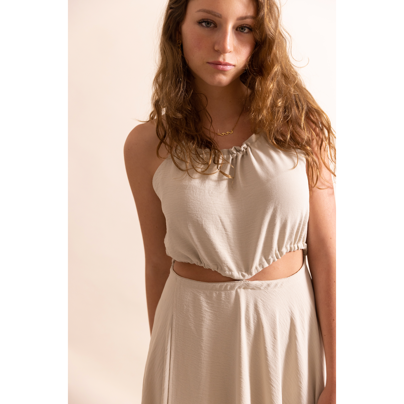 An Elegant Statement: What to Wear with a Halter Neck Dress Onpost An Elegant Statement: What to Wear with a Halter Neck Dress Onpost